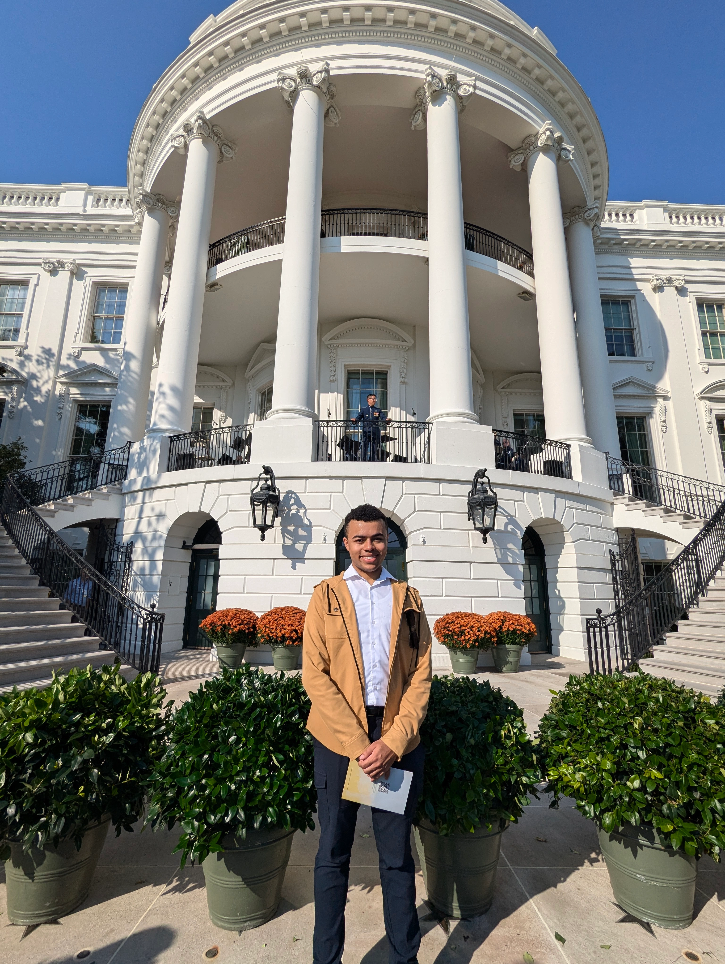 Ehab James posing in front of the Washington DC monument.